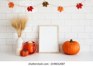 Picture Frame Mockup In Cozy Home Interior With Fall Decor, Vase Of Dried Wheat, Candle, Pumpkin. Autumn, Thanksgiving, Halloween Concept.