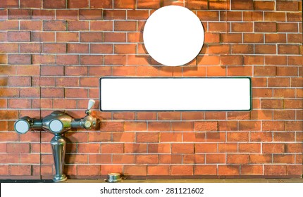 Picture frames on brick wall and Dispensing beer