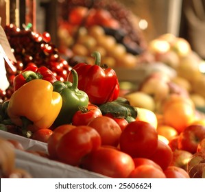 A picture of fresh tomatoes, bell peppers and other vegetables.  Look for more in MY PORTFOLIO