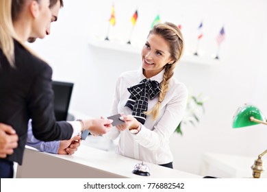 Picture Of Guests Paying For Hotel