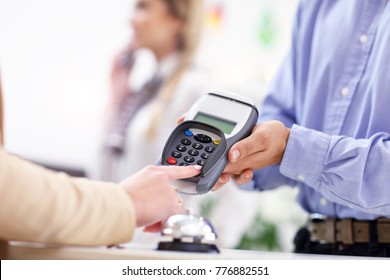 Picture of guests paying for hotel - Shutterstock ID 776882551