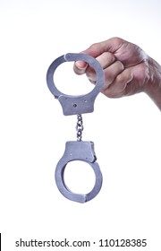 Picture Of Handcuffs,hanging On Finger.