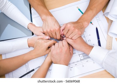 Picture Of Hands To Stay Together Over The Table To Show Solidarity Team