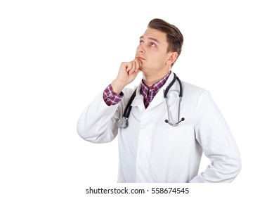 Picture Of A Handsome Young Doctor Thinking About Treatment