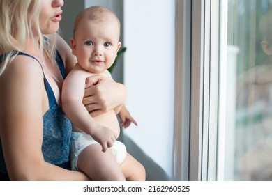 Picture Of Happy Mother With Baby Over White