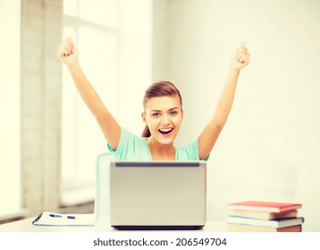 Picture Of Happy Student Girl With Laptop At School