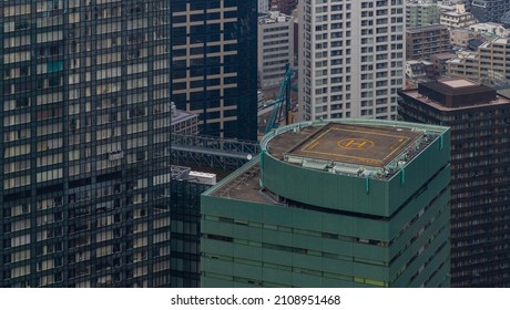 A Picture Of A Helipad At The Top Of A Building In Tokyo.