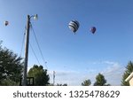 A picture of hot air balloons during the National Balloon Races in Indianola, Iowa