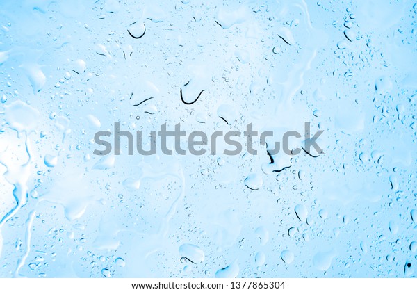 Picture\
Inside of water rain drops on car window glass\
