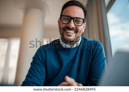 Similar – Image, Stock Photo Man relaxing during a chest massage at a spa with a serene expression.Wellness Hotel Concept image