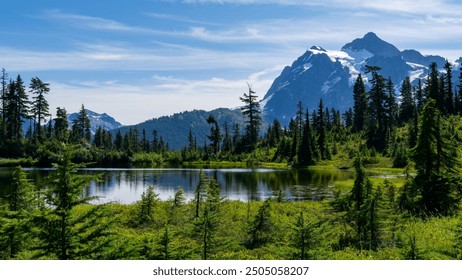 Picture Lake located in the Mt Baker of Washington State famous for its stunning reflections of Mt Sheksan, surrounded by lush alpine meadows and evergreen forests creating a picturesque settings. - Powered by Shutterstock