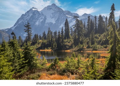 Picture Lake with snow-capped Mount Shuksan in the background showing autumn colors. Home to one of the most photographed vistas in America and even more special during the fall season.  - Powered by Shutterstock