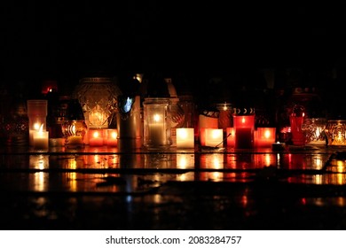 Picture Of Lighting Candles At Cemetery. Celebrating All Saints Day. November 1. Autumn Holidays. Souls. Memorial. Lantern.