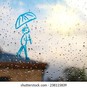 Picture Of Man With An Umbrella On A Window In The Drops Of Rain In The Sun As Rays (optimism, Despair Improvements - Concept)