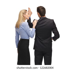 picture of man and woman working with something imaginary.