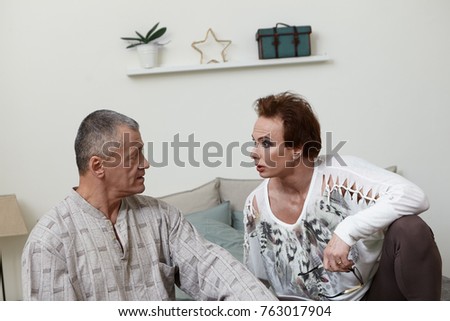 Similar – Caregiver accommodating  pillow to elderly female patient