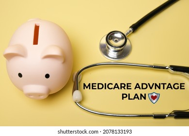A picture of Medicare advantage plan word, piggy bank, shield and heart insight. Medicare advantage concept	 - Shutterstock ID 2078133193