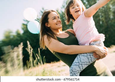 Picture Of Mother And Child With Special Needs