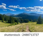 Picture of mountains, trees and blue sky in Breckenridge, Colorado.