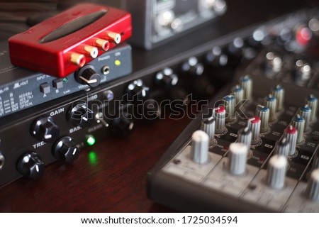 Picture of Musical amplifier Sound amplifier or Music mixer with Knobs and Jack holes. Perfect for music background concept.