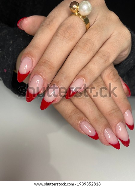 Picture of nails done in red\
enamel