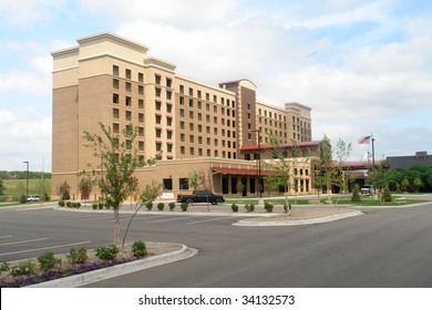                       A picture of a newly completed Hotel with empty lot