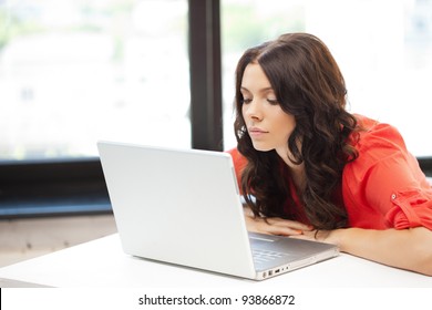 picture of pensive woman with laptop computer - Shutterstock ID 93866872