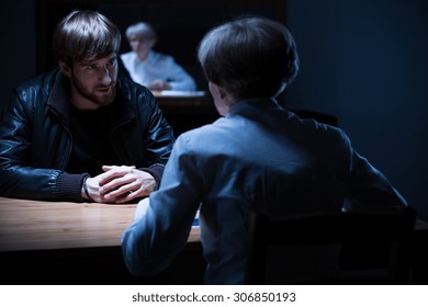 Picture Of Police Interrogation In A Dark Room