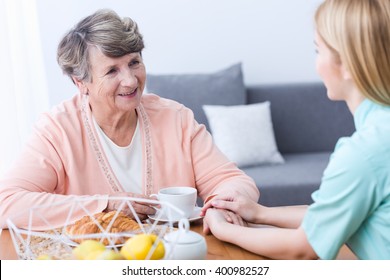 Picture of positive senior with health afflictions and carer - Shutterstock ID 400982527