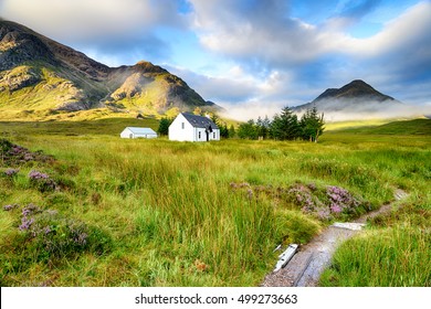 A picture postcard cottage at Glencoe in the Scottish Highlands
