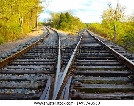 Picture of railroad tracks splitting in southwest Virginia during the spring.