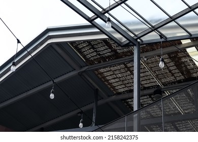 Picture of the roof structure and the building, installation of the base of columns and large steel beams made of strong materials.