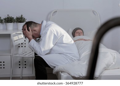 Picture Of A Sad Doctor Grieving His Patient