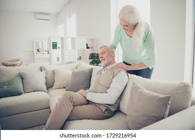 Picture Of Satisfied Exhausted After Work Old Guy Sitting On Divan Feeling Perfect While Getting Soft Tender Massage From His Beloved Old Lady