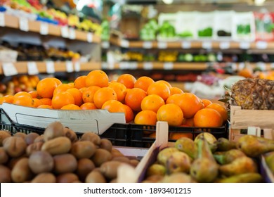 Picture Of Seasonal Fruits On Counter In Food Market, No People