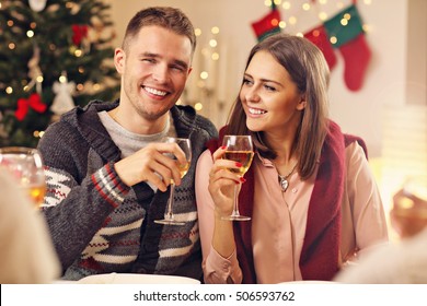 Picture showing group of friends celebrating Christmas at home Stock Photo