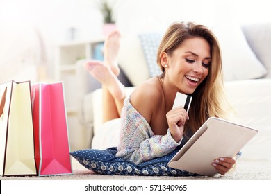 Picture showing pretty woman shopping online with credit card