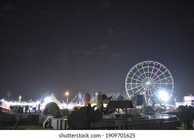 A Picture Shows The Night Of Baghdad In The Al-Zawraa Park With A Large Windmill