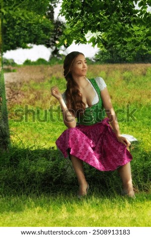 Similar – Foto Bild Frau im Dirndl im bayerischen Biergarten sitzend und Bier trinkend mit traditioneller bayerischer Küche mit Schweinshaxe, gebratener Schweinshaxe auf einem Tisch