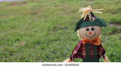 A Picture Of A Small Scarecrow Doll