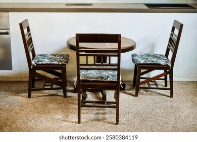 Picture of a solid wood dining table with a classic design for dining in the living room with a natural atmosphere.