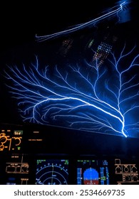 Picture of St. Elmo’s Fire in airplane cockpit at night.