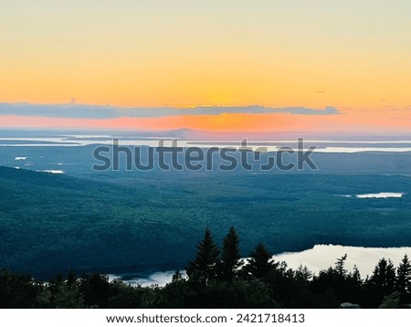 Picture of the sunset at the top of Cadillac Mountain in Acadia National Park