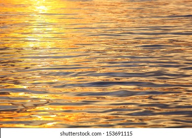 Picture Of The Surface Water In The Sunset Time 