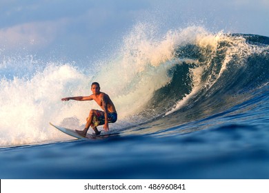 Picture of Surfing a Wave.Sumbawa Island. Indonesia. - Shutterstock ID 486960841