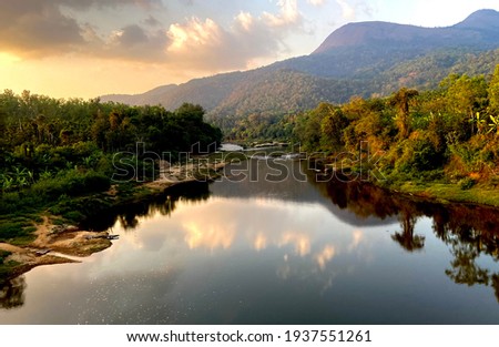 The picture was taken in the midst of western ghats of India. The river Bhadra flows in the valleys of the western ghats aka Malnadu.