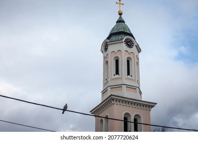Picture of the tower of the Serbian church, in Obrenovac Serbia indicating the time. Obrenovac is a town located in the South part of Belgrade, Serbia. - Shutterstock ID 2077720624