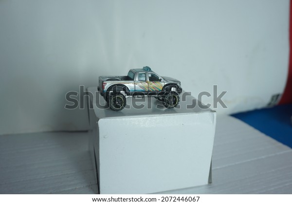 picture of toy\
car with front light\
photography