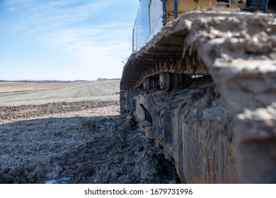 Picture From The Tracks Of A Bulldozer Showing Empty Farmland To The Horizon Scheduled For Housing Development  