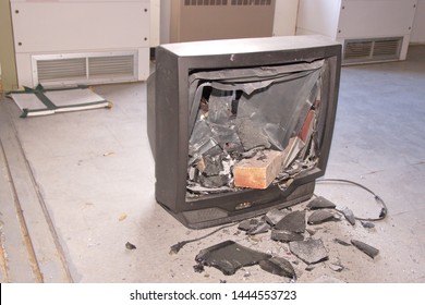 A Picture Tube Television Found Smashed With A Brick, In An Abandoned Building.